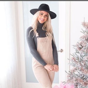 Overalls from Orange Creek brand,Color of overalls is Corduroy, size is Medium